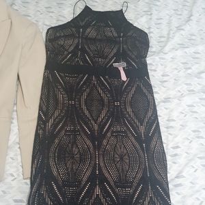 A lovely black/cream dress ,size US10 by Lipsy